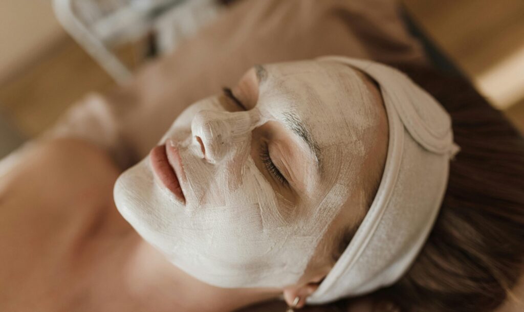 pexels-photo-6663382-6663382 Woman enjoying a spa treatment with a relaxing facial mask indoors.